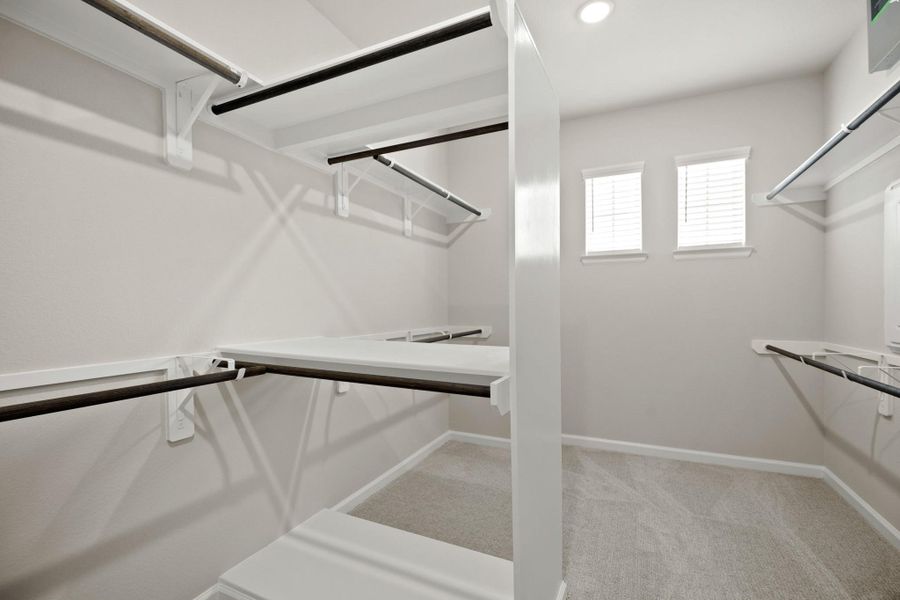 Huge walk-in closet in primary suite (*Photo not of actual home and used for illustration purposes only.) Huge walk-in closet in primary suite (*Photo not of actual home and used for illustration purposes only.)