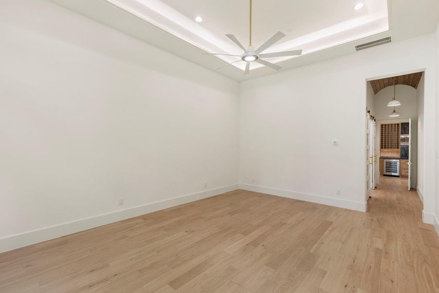 Primary Suite with hallway to Bathroom