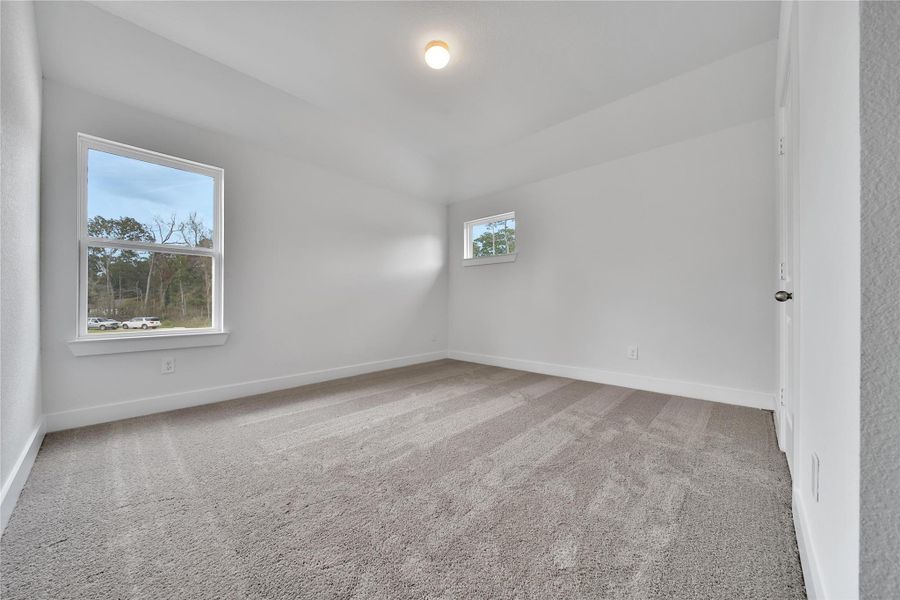 Spacious, unfurnished interior of a new home in Roman Forest, New Caney (Image 26).
