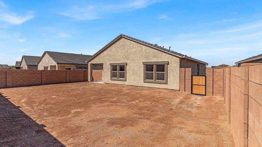 Front exterior of a new home in Barnett Village, Marana, AZ, highlighting curb appeal (Image 25).