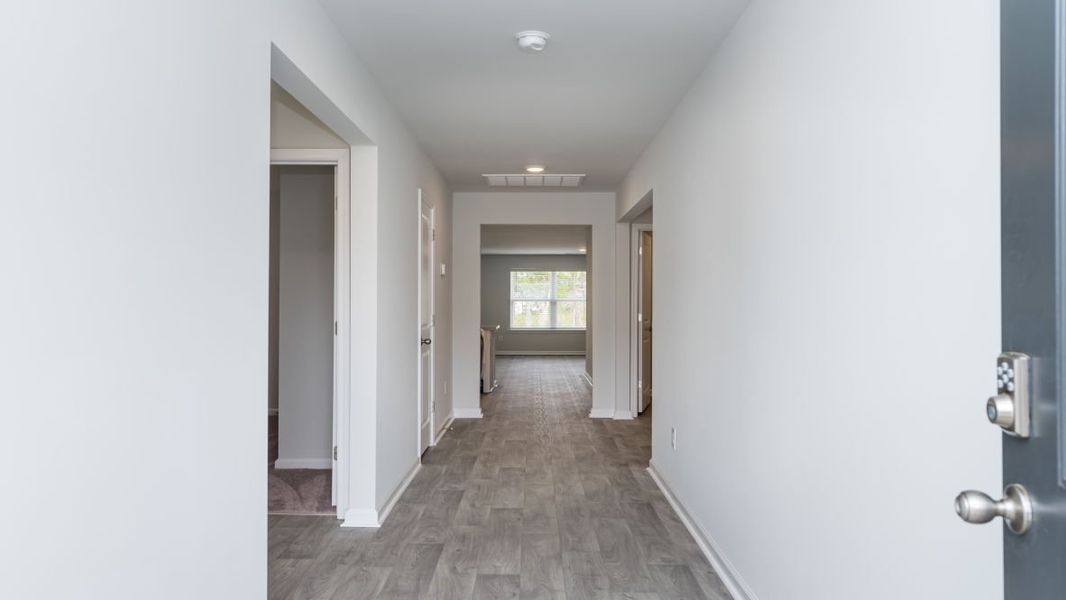 Representative unfurnished interior of a home built from the CALI by D.R. Horton in Jordanville Farms, Galivants Ferry (Image 13).