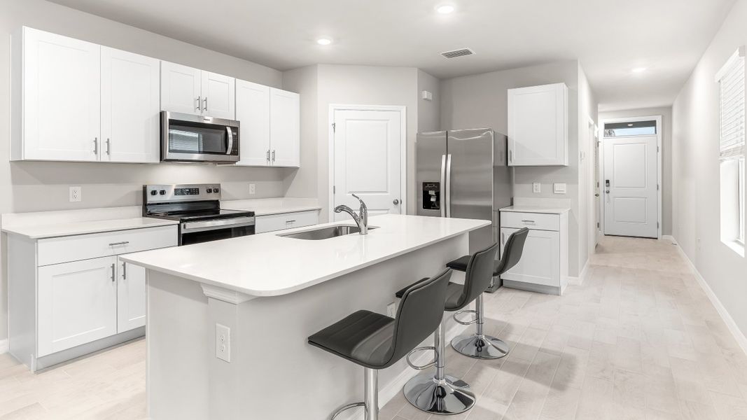 Representative furnished interior of a home built from the HARPER by D.R. Horton in Coral Bay - Express & Tradition, North Fort Myers (Image 9).