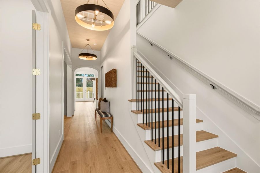 Step into a bright and inviting foyer that sets the tone for the home with elegant finishes, soaring ceilings, and a seamless flow into the main living spaces. Step into a bright and inviting foyer that sets the tone for the home with elegant finishes, soaring ceilings, and a seamless flow into the main living spaces.