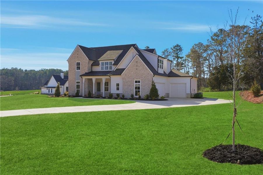 Front exterior of a new home in , Rydal, GA, highlighting curb appeal (Image 31).