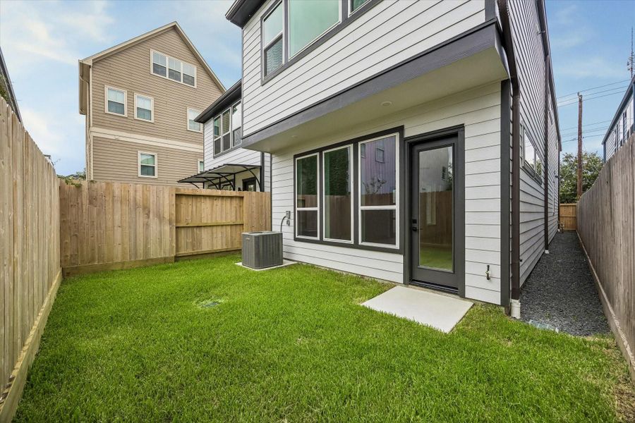 Exterior details and patio area of a home in The Heights Haus Collection, Houston (Image 4).