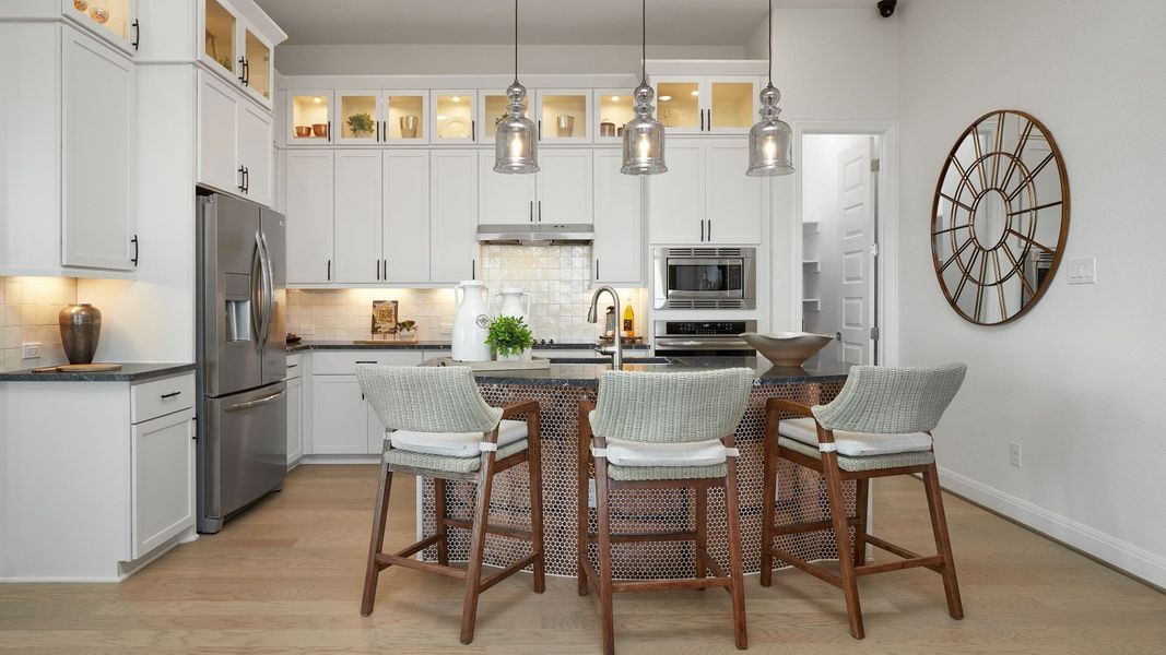 Representative furnished interior of a home built from the Mahogany by Brightland Homes in Sunterra, Katy (Image 5).
