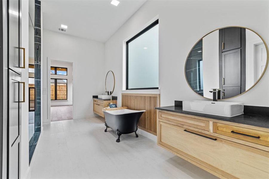 Bathroom featuring hardwood / wood-style floors and vanity