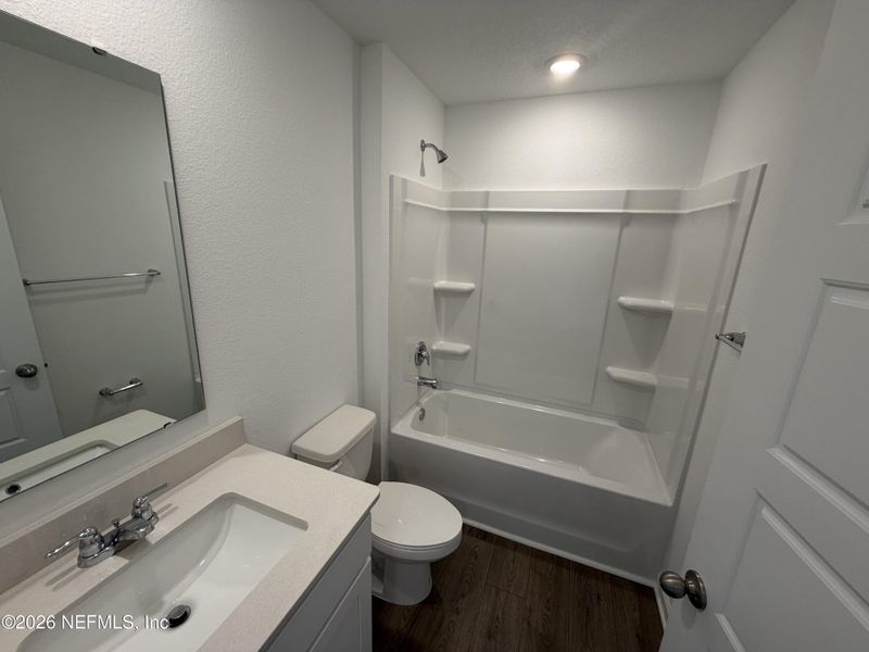 Furnished interior view inside a new home in Grand Reserve, Bunnell (Image 7).