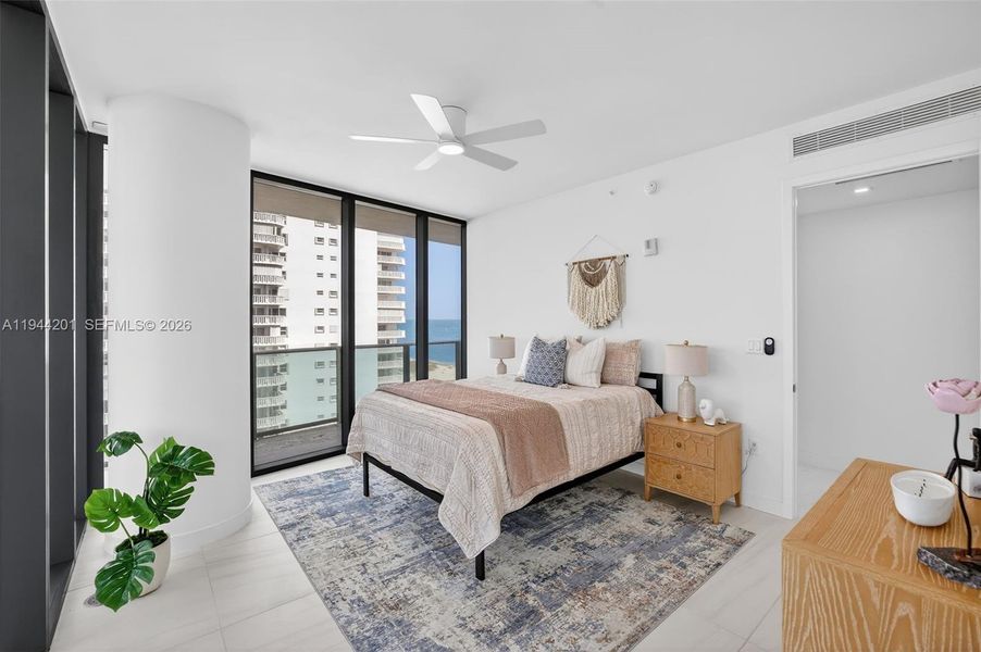Guest Bedroom #2 - ensuite bathroom w/ walk in closet, w/ wrap around balcony and views to the west and north