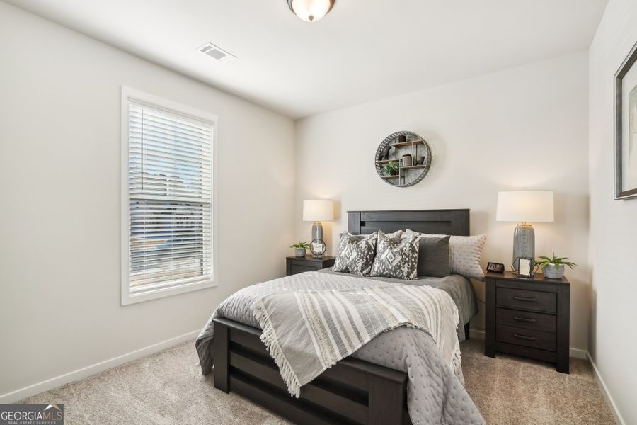 Furnished interior view inside a new home in Ponderosa Farms Reserve, Gainesville (Image 15).