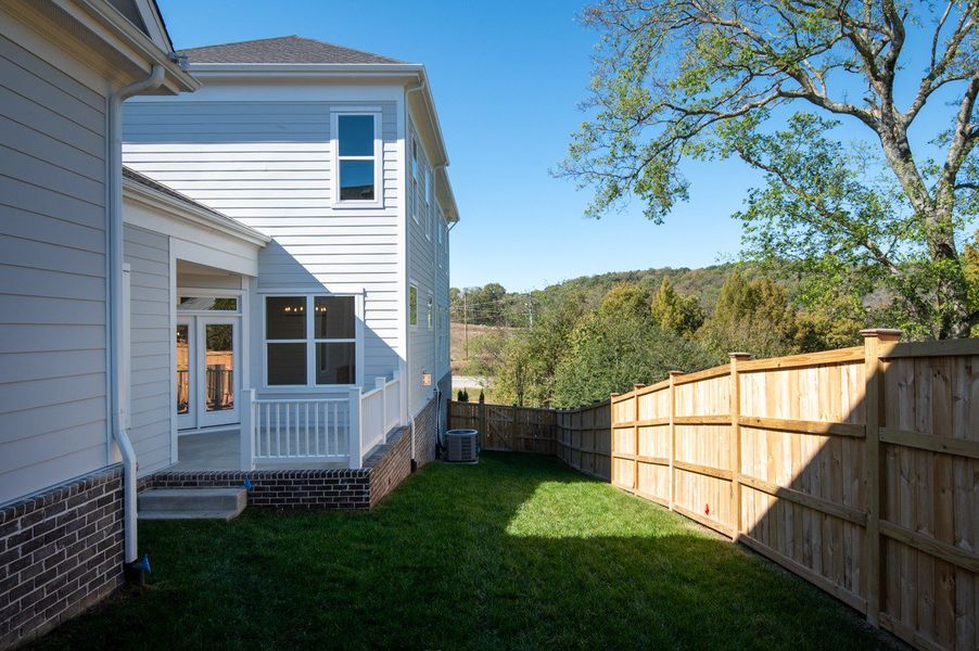 Exterior details and patio area of a home in Southbrooke, Franklin (Image 8).