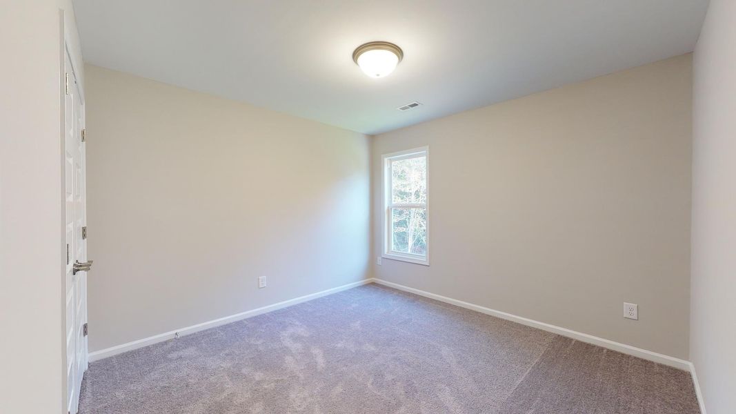Representative unfurnished interior of a home built from the Westin A by JC Jackson Homes,LLC in Heritage Pointe, Newport (Image 16).