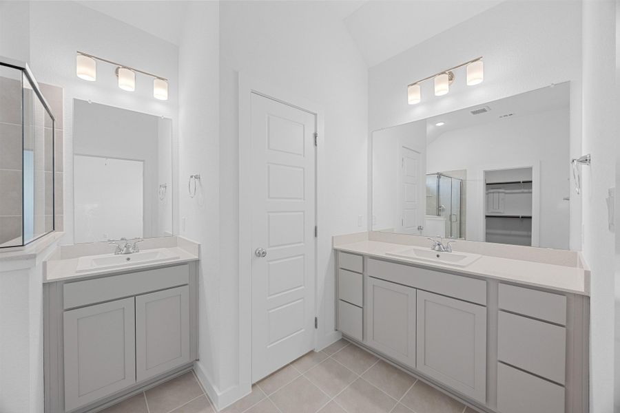 Primary Bath in the Pecan II home plan by Trophy Signature Homes – REPRESENTATIVE PHOTO