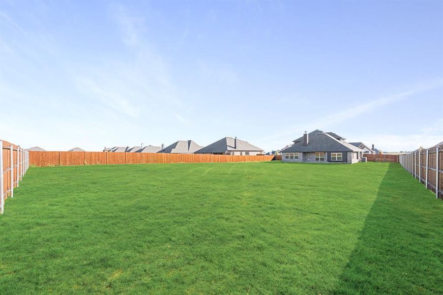Exterior details and patio area of a home in Coyote Crossing, Godley (Image 26). Exterior details and patio area of a home in Coyote Crossing, Godley (Image 26).
