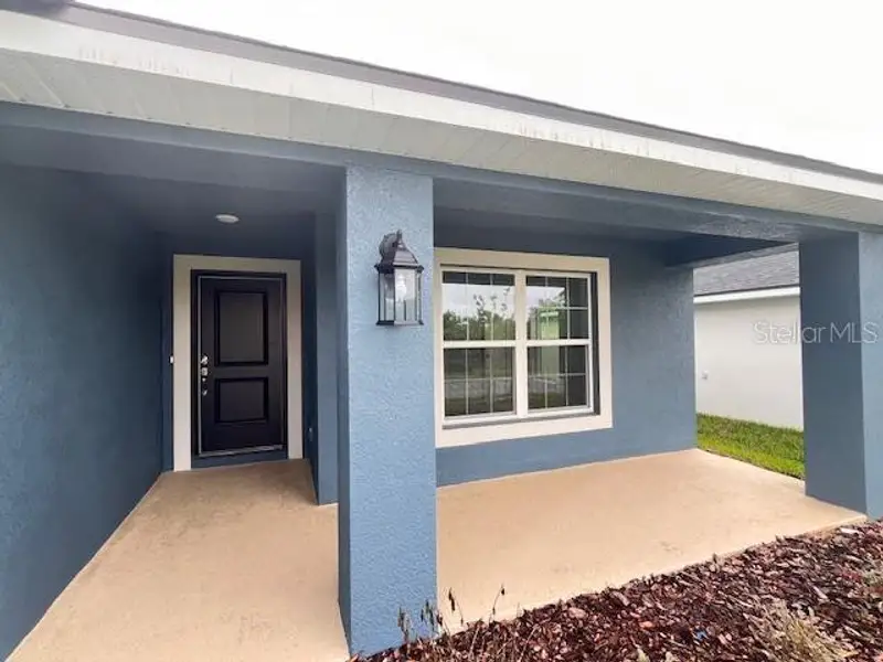 Exterior details and patio area of a home in Abbey Glen, Dade City (Image 3). Exterior details and patio area of a home in Abbey Glen, Dade City (Image 3).