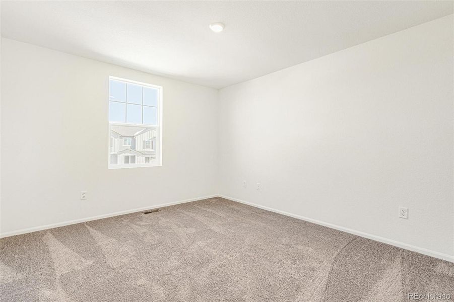 Spacious, unfurnished interior of a new home in Farmlore, Brighton (Image 27).