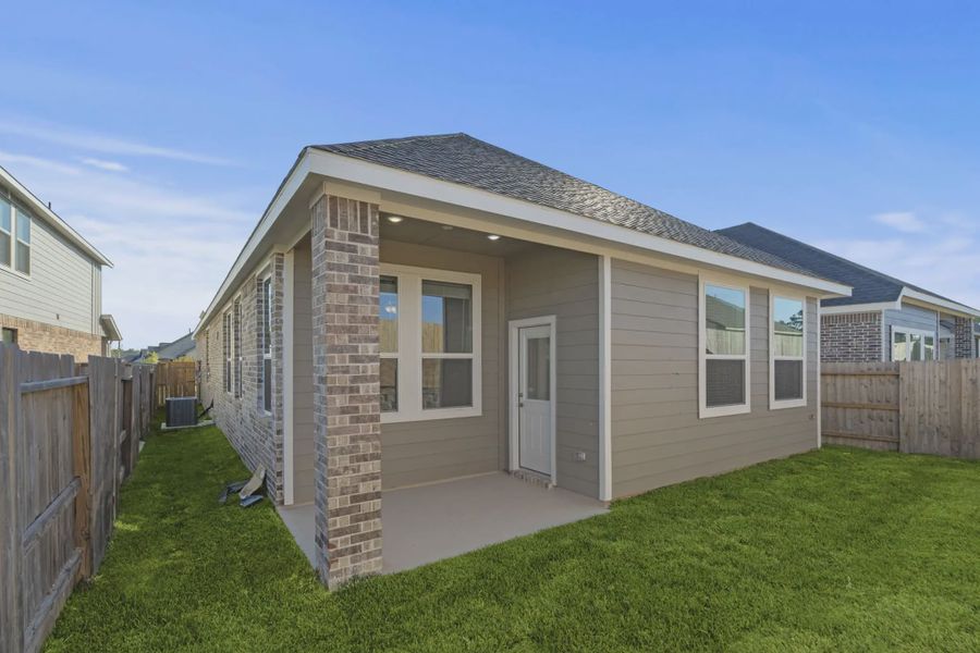 Representative exterior details of a home built from the Athens by Chesmar Homes in Sunterra, Katy (Image 3).