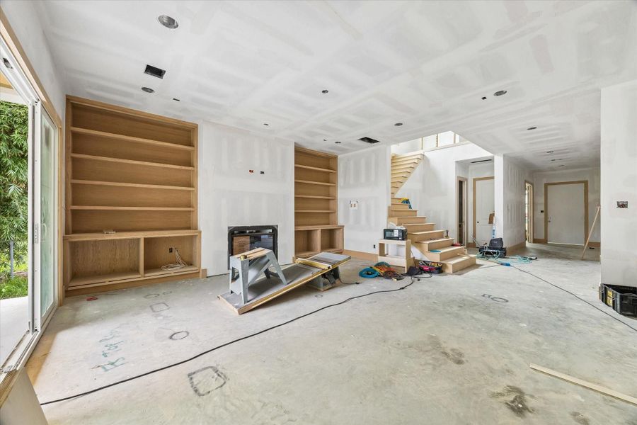 LIVING ROOM - Living room overlooking the sliding doors leading to your backyard oasis. Main living areas offer an open concept floor plan. -- **Current construction as of 4/14/26** LIVING ROOM - Living room overlooking the sliding doors leading to your backyard oasis. Main living areas offer an open concept floor plan. -- **Current construction as of 4/14/26**