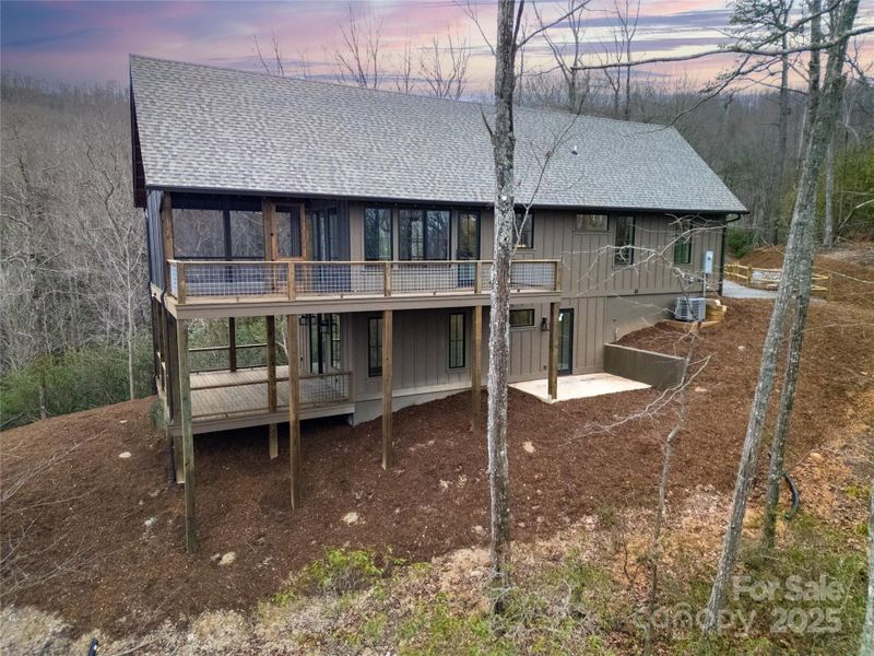 Exterior details and patio area of a home in , Pisgah Forest (Image 31).