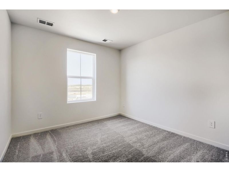Spacious, unfurnished interior of a new home in Kinston, Loveland (Image 9).