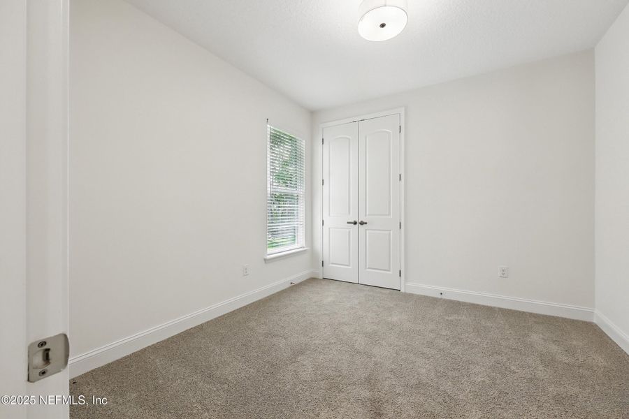 Spacious, unfurnished interior of a new home in Goose Creek Estates, Green Cove Springs (Image 16).