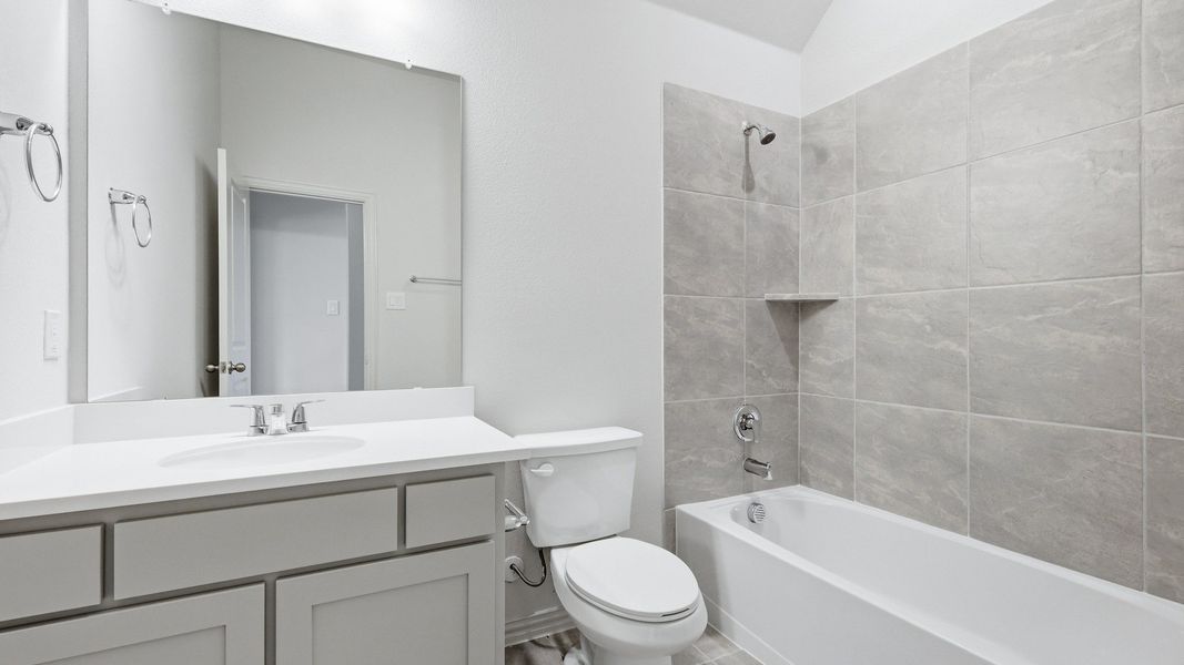 Furnished interior view inside a new home in Green Meadows Premier, Celina (Image 5).