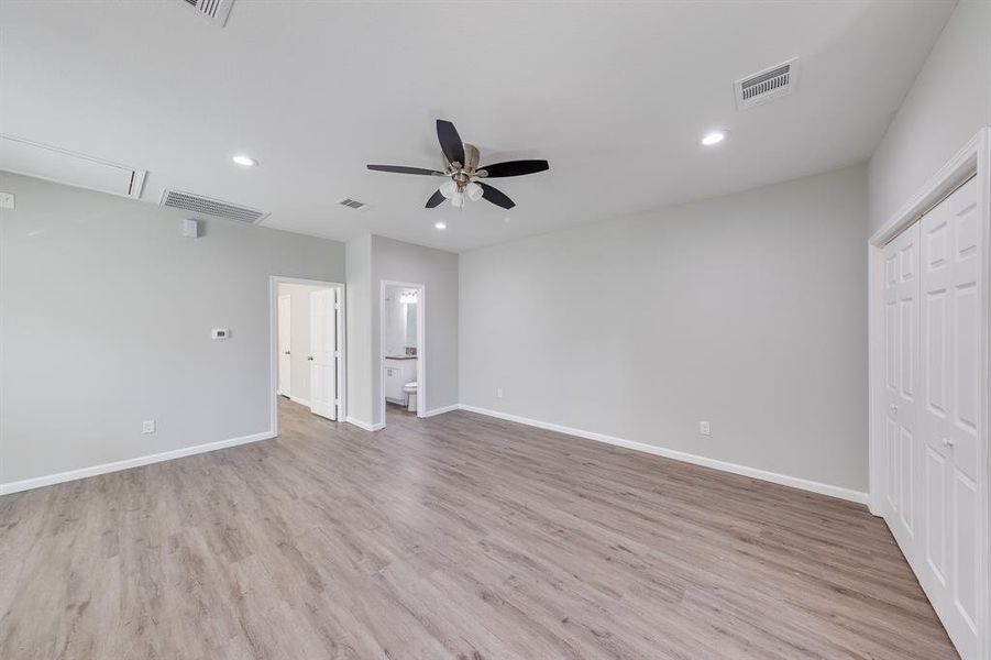 The third bedroom, located on the second floor, is a versatile and inviting space that’s perfect for family members or guests. Each room in this home features its own personal closet, ensuring ample storage for clothing and belongings.