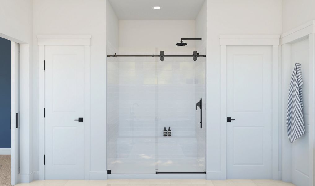 Primary bath with glass shower enclosure