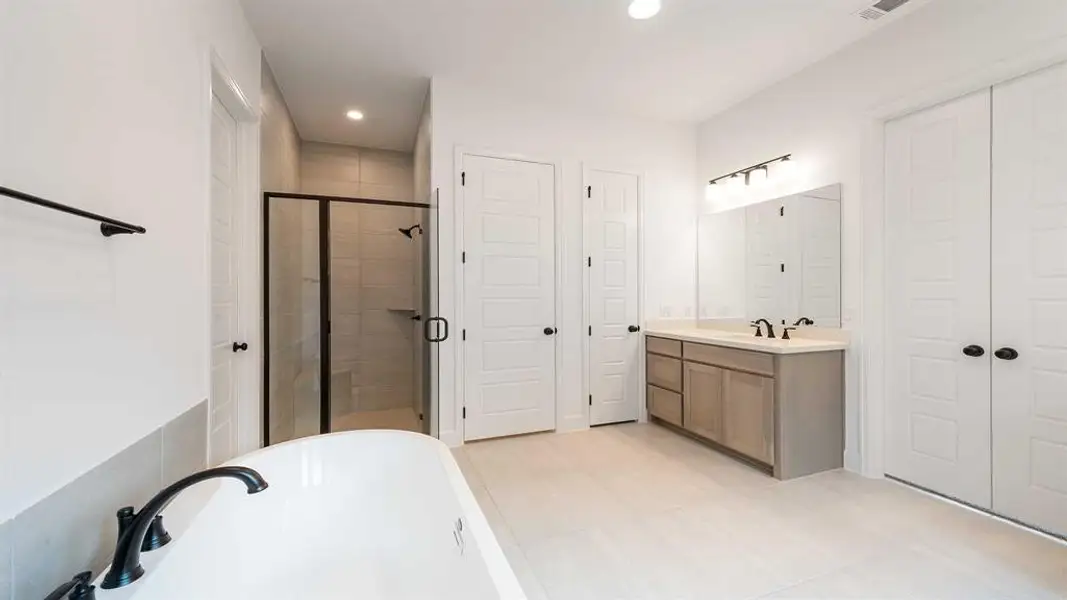 Furnished interior view inside a new home in North Sky 55', Celina (Image 7).