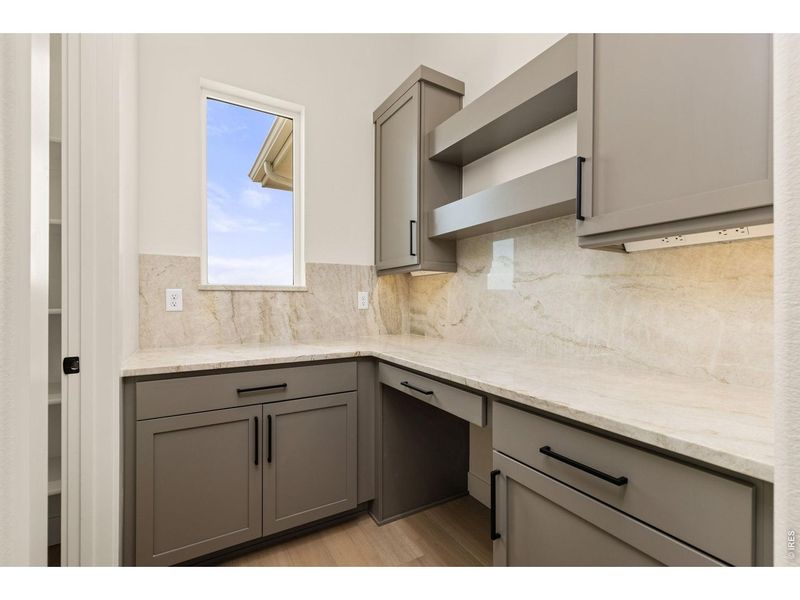 Furnished interior view inside a new home in RainDance, Windsor (Image 7).