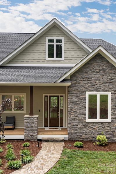 Exterior details and patio area of a home in , Alexander (Image 35).