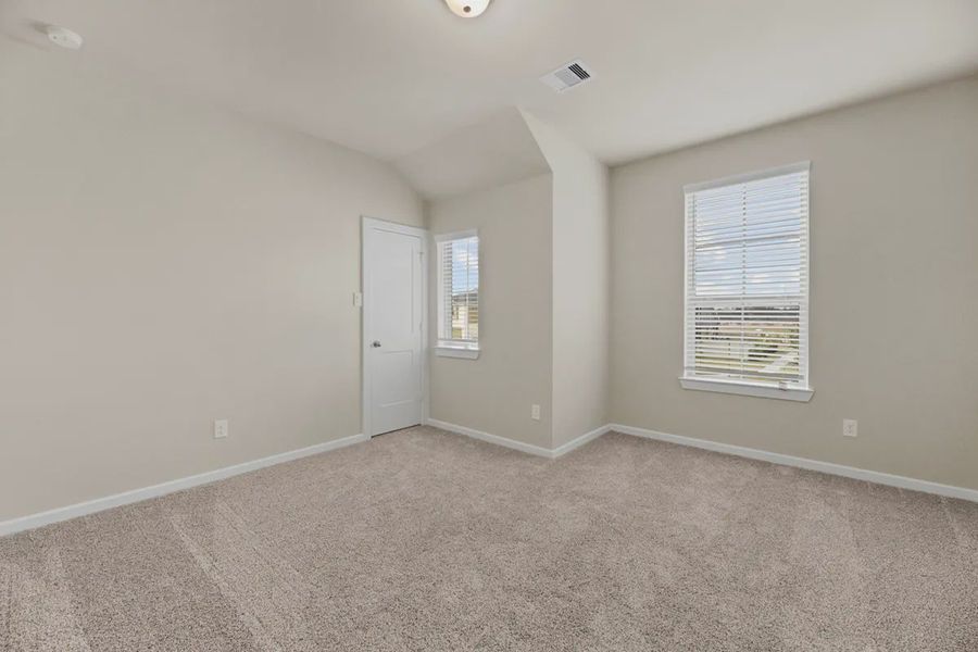 Representative unfurnished interior of a home built from the Sedona by Chesmar Homes in Sunterra, Katy (Image 7).