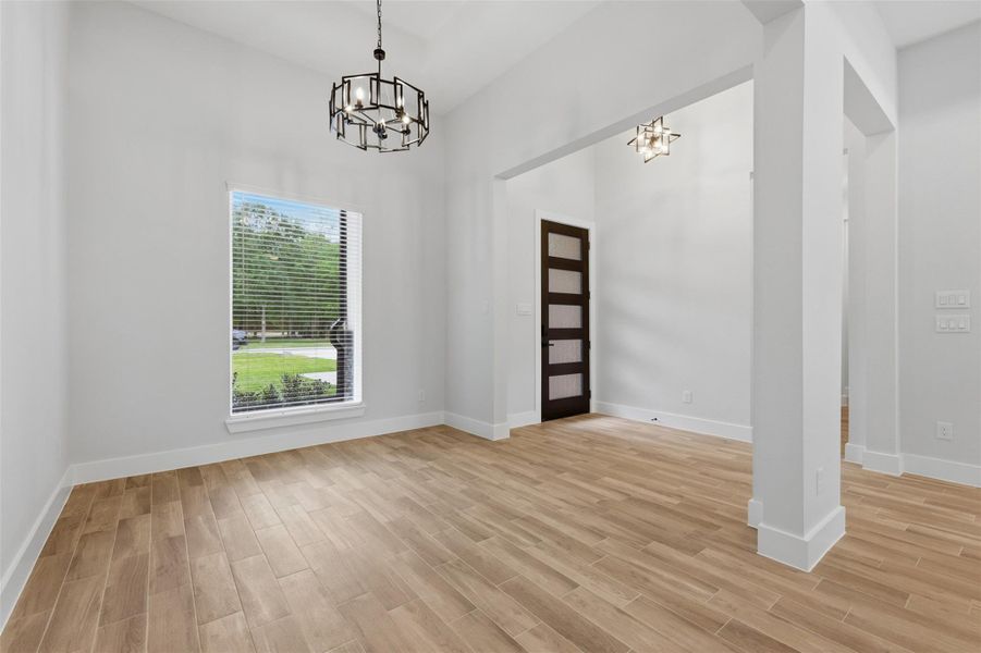 You are greeted at the entry by the formal dining space!