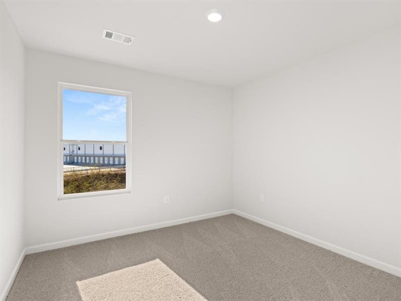 Spacious, unfurnished interior of a new home in Waypoint, Flowery Branch (Image 14).