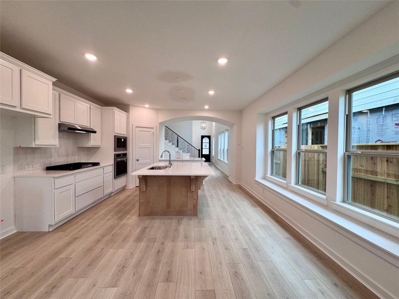 Furnished interior view inside a new home in Meridiana, Manvel (Image 7).