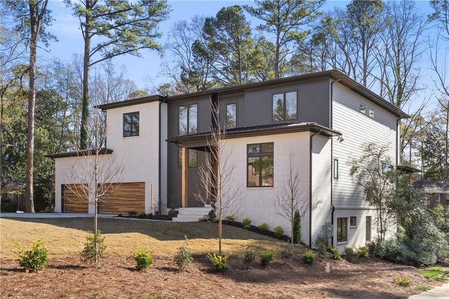 Front exterior of a new home in , Sandy Springs, GA, highlighting curb appeal (Image 28). Front exterior of a new home in , Sandy Springs, GA, highlighting curb appeal (Image 28).
