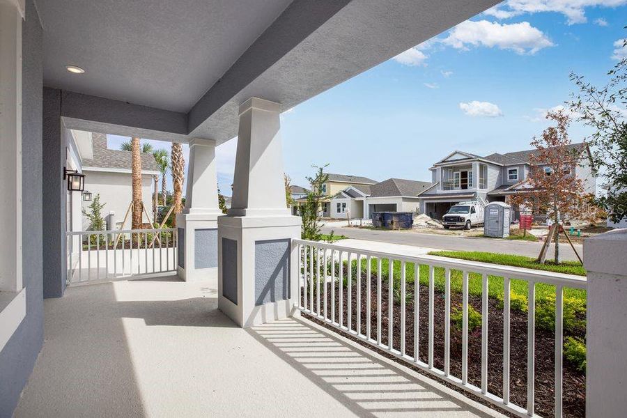 Exterior details and patio area of a home in Indigo Creek, Apollo Beach (Image 3).