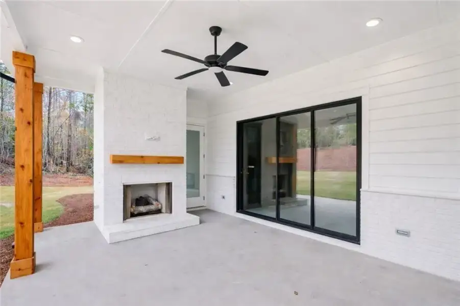 Exterior details and patio area of a home in The Manors, Jefferson (Image 4).
