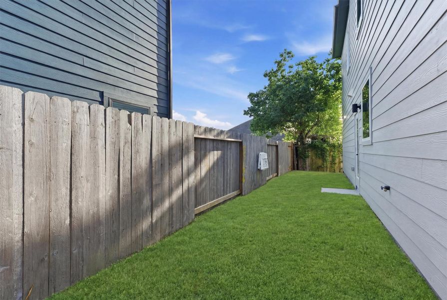 Exterior details and patio area of a home in , Houston (Image 3). Exterior details and patio area of a home in , Houston (Image 3).