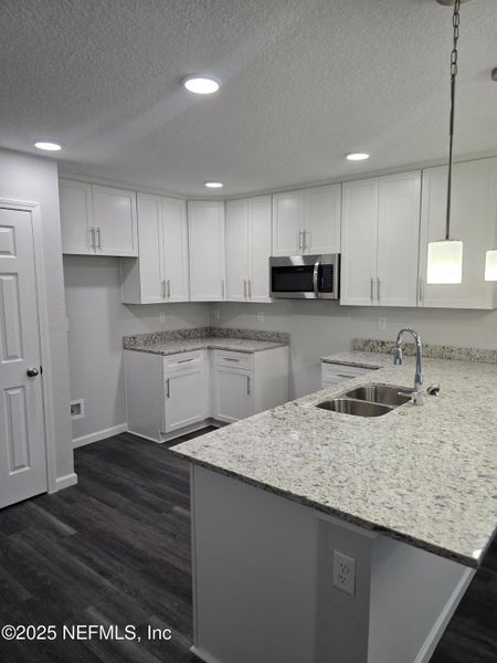 Furnished interior view inside a new home in , Jacksonville (Image 39).