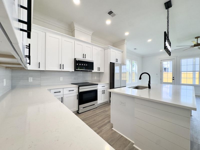 Furnished interior view inside a new home in , North Charleston (Image 7).