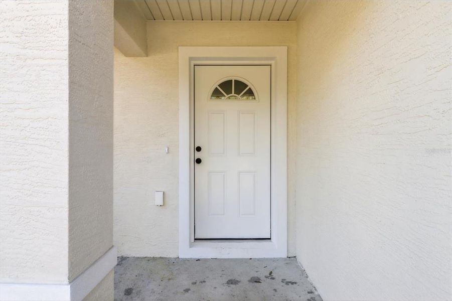 Exterior details and patio area of a home in , Citrus Springs (Image 26).