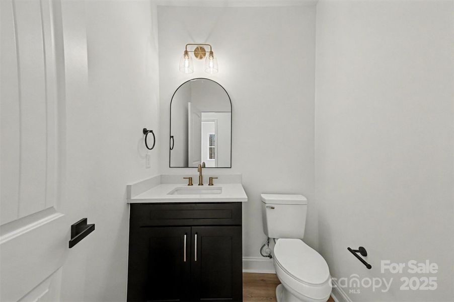 Powder room, modern and stylish fixtures Powder room, modern and stylish fixtures