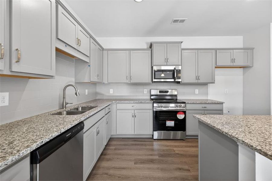 Furnished interior view inside a new home in Jameson Towns, Villa Rica (Image 5).