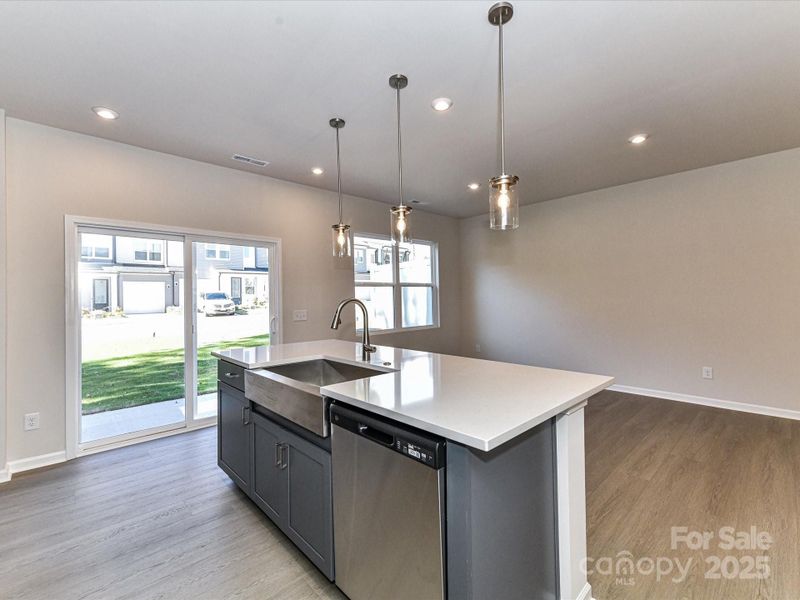 Large Central Island Ideal for Casual Dining or Entertaining.