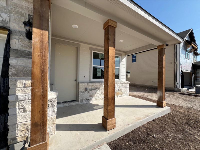 Exterior details and patio area of a home in Rolling Glen, Hutto (Image 11).