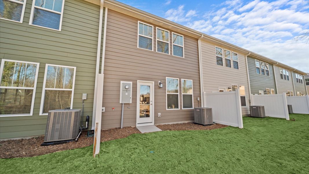 Exterior details and patio area of a home in Clayton Crossing, Arden (Image 3).