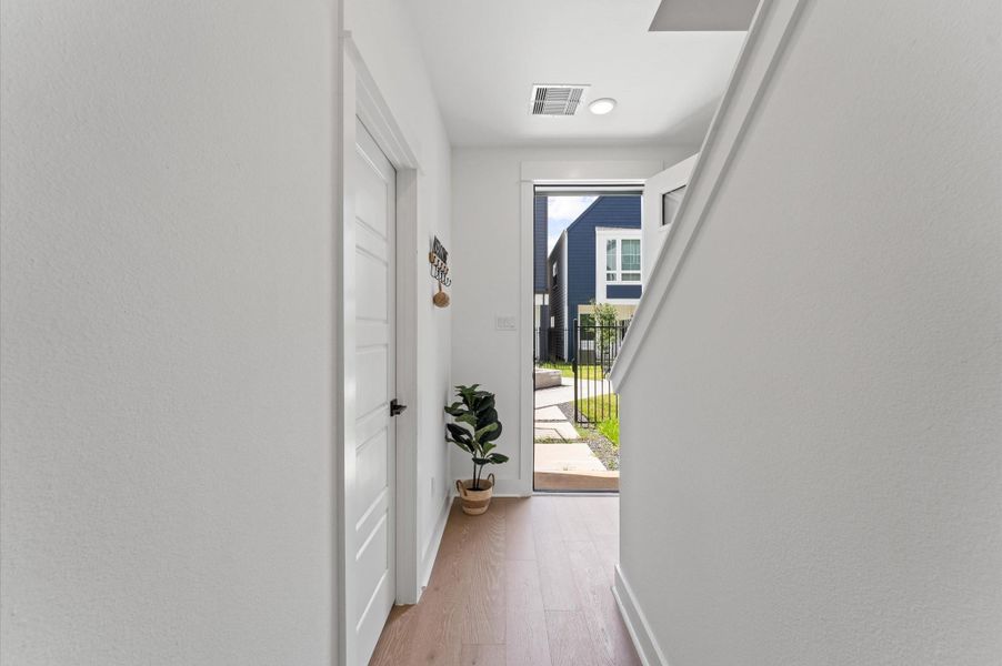 Welcome guests in style with this thoughtfully designed entrance hallway, where clean lines and warm finishes set the tone for the rest of the home. Welcome guests in style with this thoughtfully designed entrance hallway, where clean lines and warm finishes set the tone for the rest of the home.