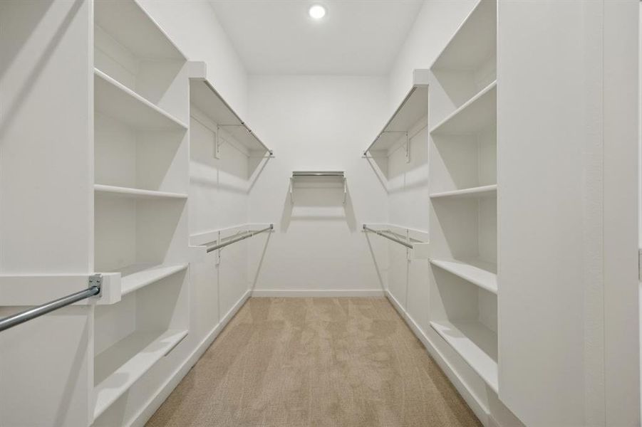 Primary Closet in the Monet II home plan by Trophy Signature Homes – REPRESENTATIVE PHOTO
