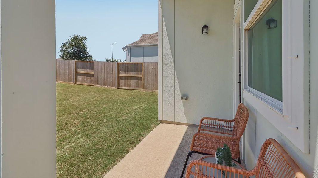 Exterior details and patio area of a home in Meridiana Chateau, Manvel (Image 3).